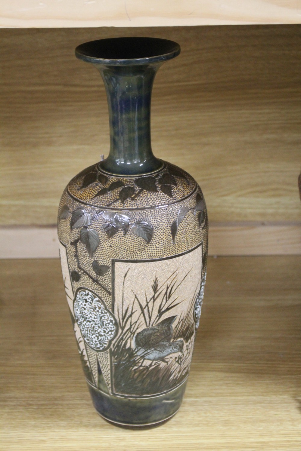 Florence E Barlow for Doulton Lambeth, a large pate sur pate partridge vase, dated 1884, 38.5cm, neck restoration